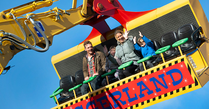 family riding the Spindizzy ride at Diggerland Durham